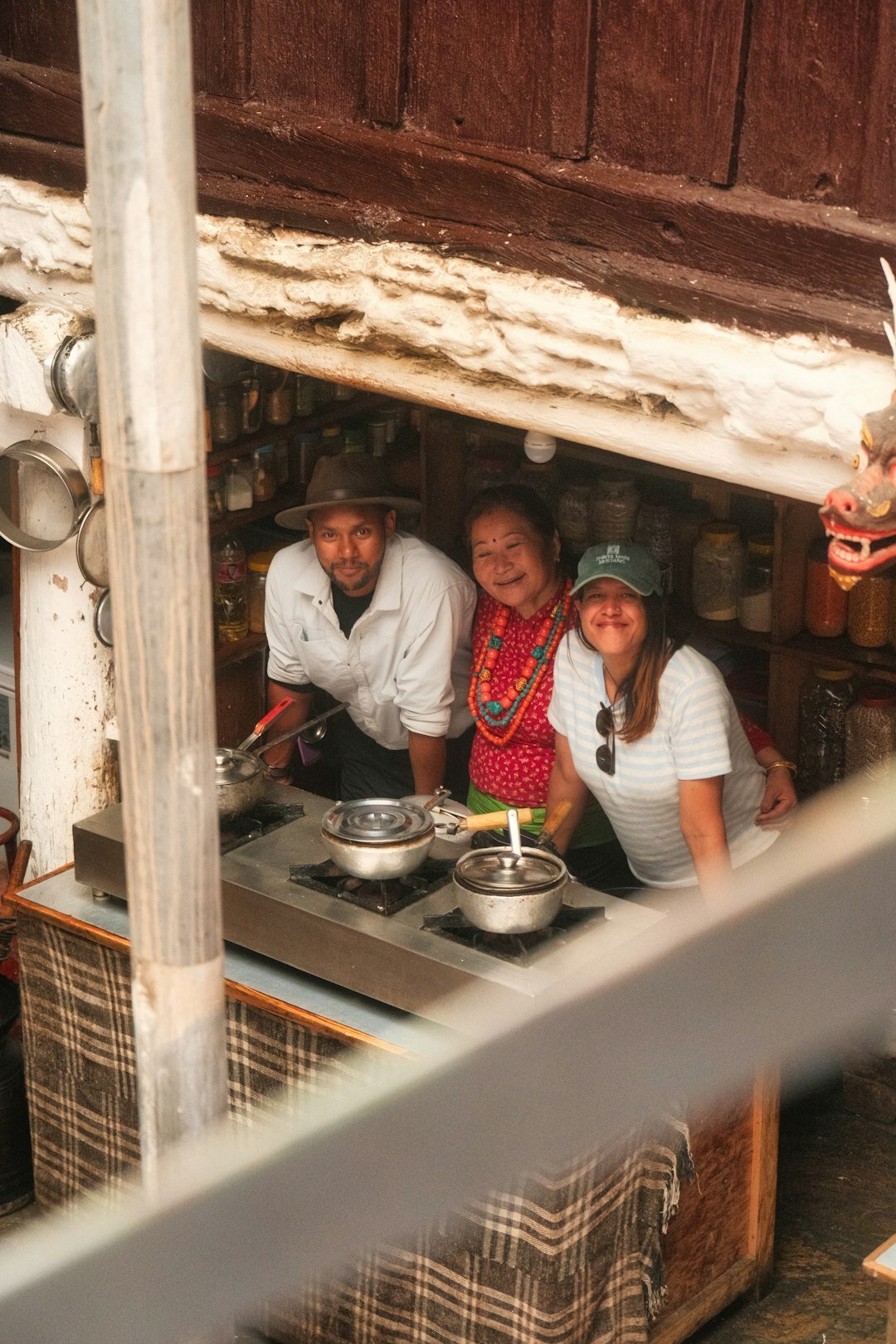 Chilean family sharing once at a table in a small kitchen